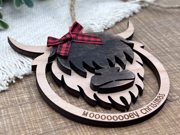 Mooooooey Christmas cow ornament